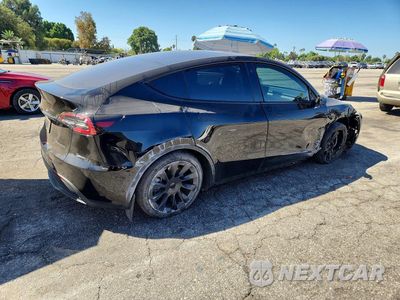 Trzecie zdjęcie samochodu z tyłu: 2021 TESLA MODEL Y VIN:5YJYGDEE3MF180236 - miniatura