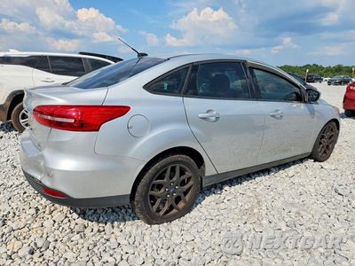 Trzecie zdjęcie samochodu z tyłu: 2016 FORD FOCUS SE VIN:1FADP3FE9GL368094 - miniatura