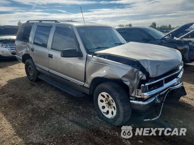 Czwarte zdjęcie samochodu z boku: 1999 CHEVROLET TAHOE K1500 VIN:1GNEK13R7XJ543941 - miniatura
