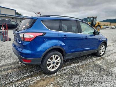 Trzecie zdjęcie samochodu z tyłu: 2018 FORD ESCAPE SE VIN:1FMCU0GD0JUB08036 - miniatura