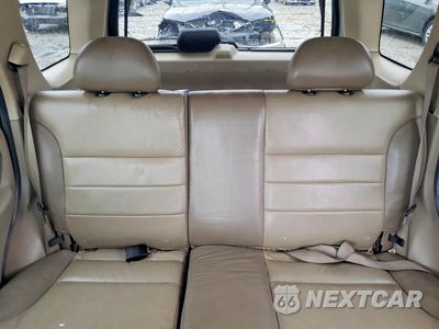 Zdjęcie 10 z 13 samochodu: 2003 FORD ESCAPE LIMITED VIN:1FMCU94113KC79018 - miniatura