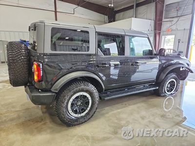 Trzecie zdjęcie samochodu z tyłu: 2023 FORD BRONCO BASE VIN:1FMEE5DP1PLB95669 - miniatura