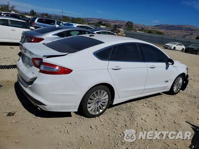 Trzecie zdjęcie samochodu z tyłu: 2014 FORD FUSION SE PHEV VIN:3FA6P0PU4ER293669 - miniatura