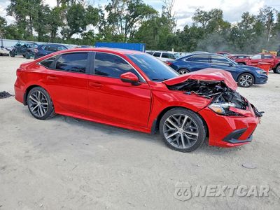 Czwarte zdjęcie samochodu z boku: 2023 HONDA CIVIC TOURING VIN:2HGFE1F99PH323462 - miniatura