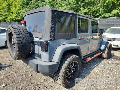 Trzecie zdjęcie samochodu z tyłu: 2015 JEEP WRANGLER UNLIMITED SPORT VIN:1C4BJWDG1FL771185 - miniatura