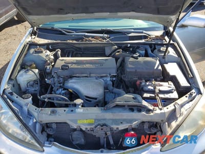 Zdjęcie 11 z 12 samochodu: 2004 TOYOTA CAMRY LE VIN:4T1BE32K14U373505 - miniatura