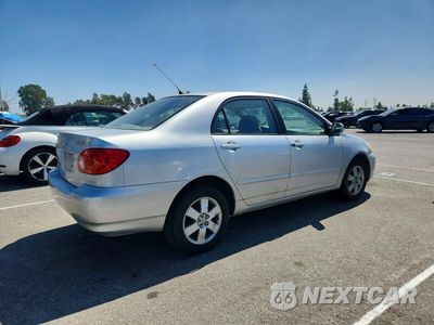 Trzecie zdjęcie samochodu z tyłu: 2004 TOYOTA COROLLA LE VIN:1NXBR32E94Z301286 - miniatura