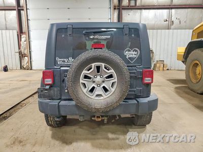 Zdjęcie 6 z 13 samochodu: 2014 JEEP WRANGLER UNLIMITED RUBICON VIN:1C4BJWFGXEL320090 - miniatura