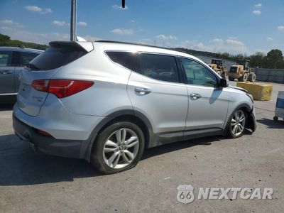 Trzecie zdjęcie samochodu z tyłu: 2014 HYUNDAI SANTA FE SPORT 2.0T VIN:5XYZWDLA6EG158409 - miniatura