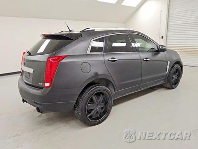 Trzecie zdjęcie samochodu z tyłu: 2012 CADILLAC SRX PERFORMANCE COLLECTION VIN:3GYFNBE3XCS648074 - miniatura