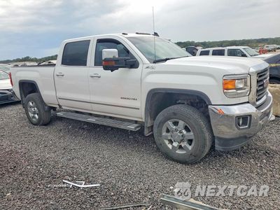 Czwarte zdjęcie samochodu z boku: 2017 GMC SIERRA K2500 SLT VIN:1GT12TEG4HF105347 - miniatura