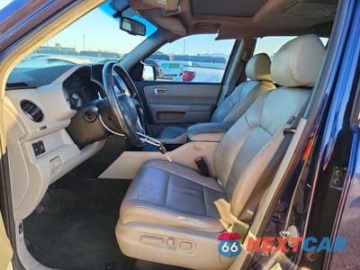 Zdjęcie 7 z 13 samochodu: 2014 HONDA PILOT TOURING VIN:5FNYF3H99EB010315 - miniatura