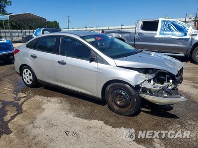Czwarte zdjęcie samochodu z boku: 2016 FORD FOCUS S VIN:1FADP3E23GL377803 - miniatura