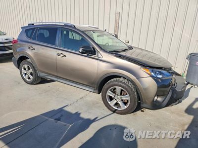 Czwarte zdjęcie samochodu z boku: 2015 TOYOTA RAV4 XLE VIN:JTMWFREV7FD071599 - miniatura