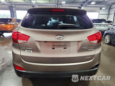 Zdjęcie 6 z 13 samochodu: 2013 HYUNDAI TUCSON LIMITED VIN:KM8JUCAC8DU684468 - miniatura