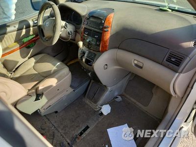 Zdjęcie 8 z 13 samochodu: 2010 TOYOTA SIENNA XLE VIN:5TDYK4CC3AS335844 - miniatura