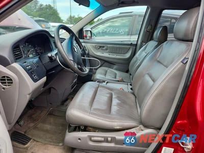 Zdjęcie 7 z 13 samochodu: 2003 HONDA ODYSSEY EXL VIN:5FNRL18033B052057 - miniatura