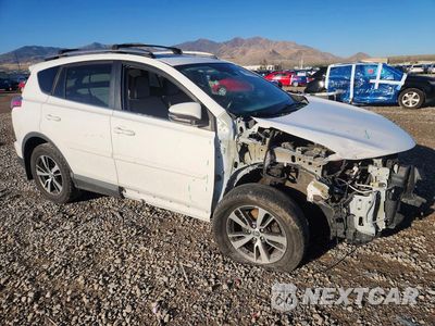 Czwarte zdjęcie samochodu z boku: 2017 TOYOTA RAV4 XLE VIN:2T3RFREV7HW672918 - miniatura