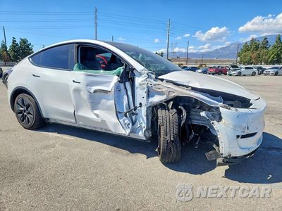 Czwarte zdjęcie samochodu z boku: 2024 TESLA MODEL Y VIN:7SAYGDEE8RF114582 - miniatura