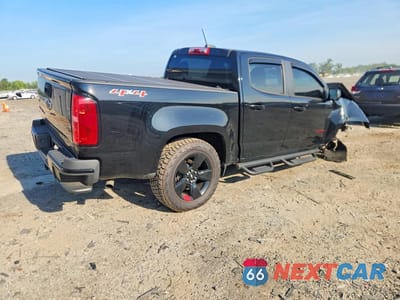 Trzecie zdjęcie samochodu z tyłu: 2019 CHEVROLET COLORADO LT VIN:1GCGTCEN7K1150292 - miniatura