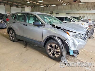 Czwarte zdjęcie samochodu z boku: 2018 HONDA CR-V LX VIN:2HKRW6H30JH205040 - miniatura