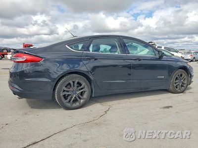Trzecie zdjęcie samochodu z tyłu: 2018 FORD FUSION SE HYBRID VIN:3FA6P0LU2JR218498 - miniatura