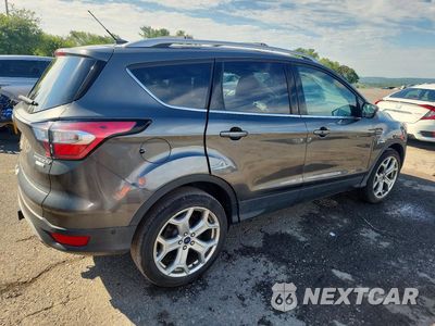 Trzecie zdjęcie samochodu z tyłu: 2017 FORD ESCAPE TITANIUM VIN:1FMCU9J91HUD03498 - miniatura