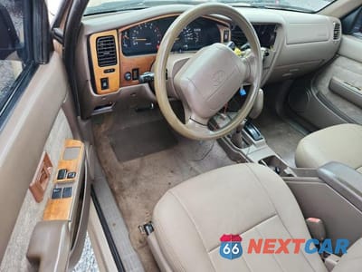 Zdjęcie 8 z 13 samochodu: 2000 TOYOTA TACOMA V6 VIN:4TAWN72N1YZ581072 - miniatura