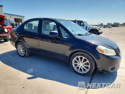 Czwarte zdjęcie samochodu z boku: 2011 SUZUKI SX4 LE VIN:JS2YC5A21B6303012 - miniatura