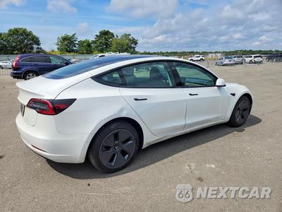 Trzecie zdjęcie samochodu z tyłu: 2021 TESLA MODEL 3 VIN:5YJ3E1EA0MF851972 - miniatura
