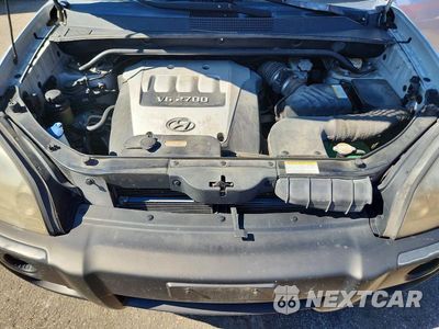 Zdjęcie 12 z 13 samochodu: 2005 HYUNDAI TUCSON GLS VIN:KM8JN12D05U216597 - miniatura
