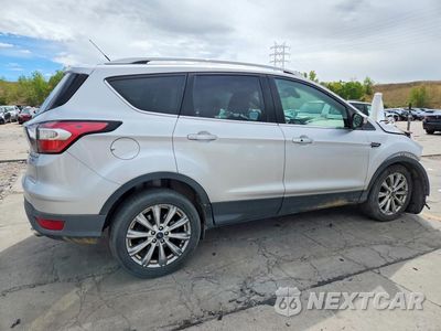 Trzecie zdjęcie samochodu z tyłu: 2017 FORD ESCAPE TITANIUM VIN:1FMCU9J94HUE18208 - miniatura