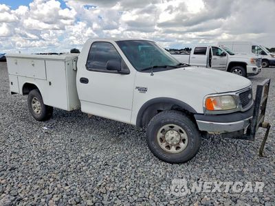 Czwarte zdjęcie samochodu z boku: 1999 FORD F250 VIN:1FTPF28L4XNC02554 - miniatura