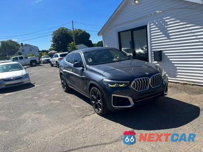 Czwarte zdjęcie samochodu z boku: 2020 BMW X6 XDRIVE40I VIN:5UXCY6C03L9C97111 - miniatura