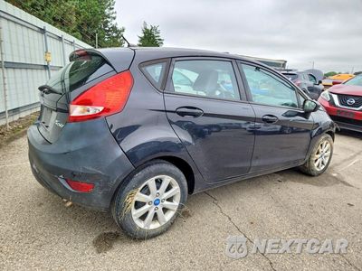 Trzecie zdjęcie samochodu z tyłu: 2011 FORD FIESTA SE VIN:3FADP4EJ0BM238796 - miniatura