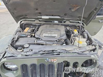 Zdjęcie 12 z 13 samochodu: 2015 JEEP WRANGLER UNLIMITED SAHARA VIN:1C4HJWEG8FL654910 - miniatura