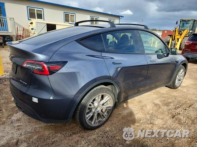 Trzecie zdjęcie samochodu z tyłu: 2023 TESLA MODEL Y VIN:7SAYGDEE8PA108937 - miniatura