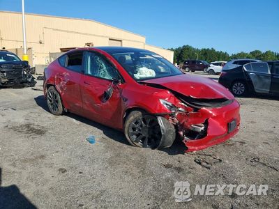 Czwarte zdjęcie samochodu z boku: 2022 TESLA MODEL Y VIN:7SAYGDEE4NF438493 - miniatura
