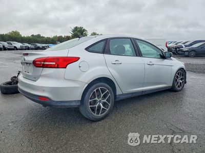 Trzecie zdjęcie samochodu z tyłu: 2017 FORD FOCUS SEL VIN:1FADP3H27HL312823 - miniatura