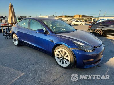 Czwarte zdjęcie samochodu z boku: 2023 TESLA MODEL 3 VIN:5YJ3E1EA5PF542955 - miniatura