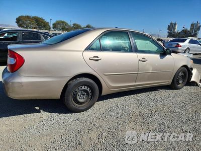 Trzecie zdjęcie samochodu z tyłu: 2003 TOYOTA CAMRY LE VIN:JTDBE32K430142849 - miniatura