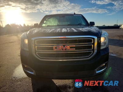 Piąte zdjęcie samochodu w środku: 2019 GMC YUKON SLT VIN:1GKS1BKC8KR102397 - miniatura