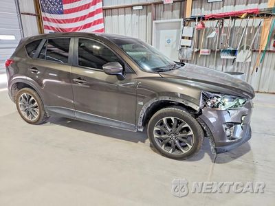 Czwarte zdjęcie samochodu z boku: 2016 MAZDA CX-5 GT VIN:JM3KE4DY9G0898004 - miniatura