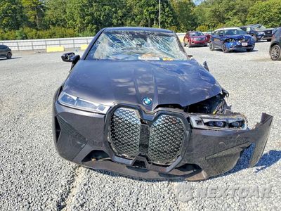 Piąte zdjęcie samochodu w środku: 2023 BMW IX M60 VIN:WB533CF03PCM45558 - miniatura