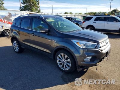 Czwarte zdjęcie samochodu z boku: 2018 FORD ESCAPE TITANIUM VIN:1FMCU9J93JUC79744 - miniatura