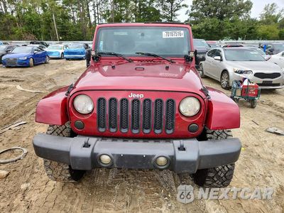 Piąte zdjęcie samochodu w środku: 2012 JEEP WRANGLER UNLIMITED SPORT VIN:1C4BJWDG0CL142089 - miniatura