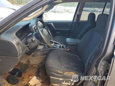 Zdjęcie 7 z 13 samochodu: 2004 JEEP GRAND CHEROKEE LAREDO VIN:1J4GW48S54C325364 - miniatura
