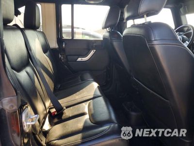 Zdjęcie 11 z 13 samochodu: 2013 JEEP WRANGLER UNLIMITED SAHARA VIN:1C4BJWEG4DL526862 - miniatura