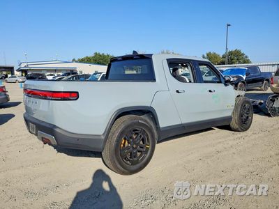 Trzecie zdjęcie samochodu z tyłu: 2023 RIVIAN R1T ADVENTURE VIN:7FCTGAAA8PN019456 - miniatura
