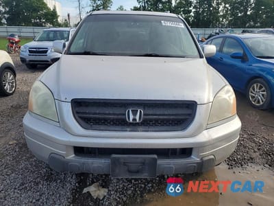 Piąte zdjęcie samochodu w środku: 2005 HONDA PILOT EXL VIN:2HKYF18535H572813 - miniatura